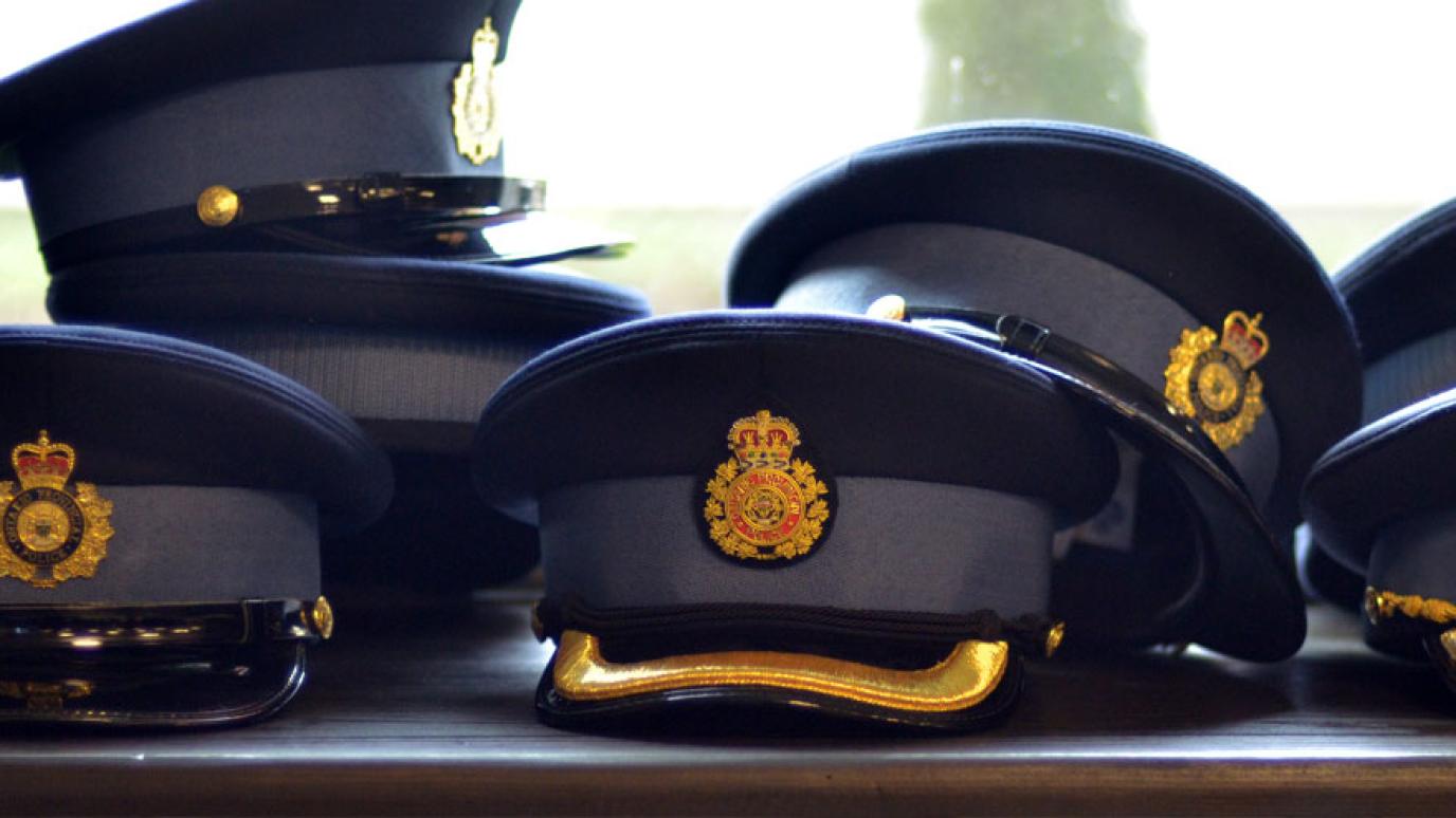 Pile of OPP black brimmed hats