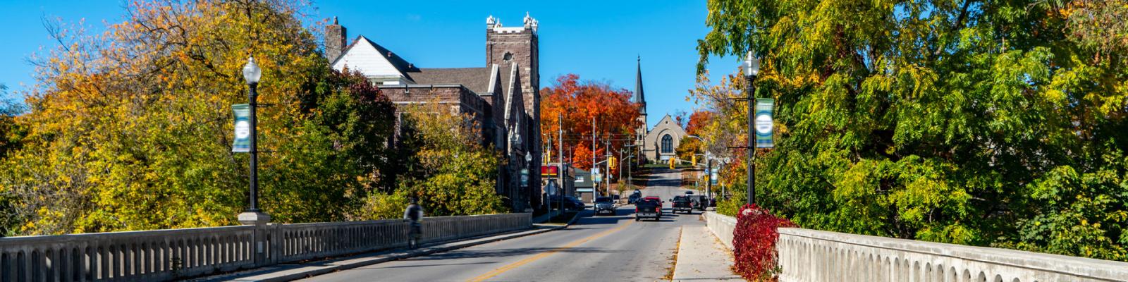  View of down the road of St. Andrew's Church from a bridge in Downtown Fergus