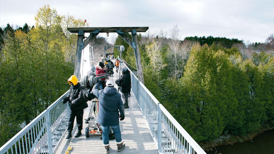 Film crew filming on the Tressle Bridge in Aboyne